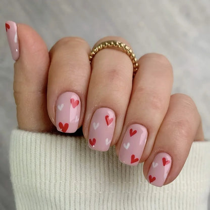 24 pieces of short square fake nails, featuring a halo dyed gradient heart and a colorful French design in European and American